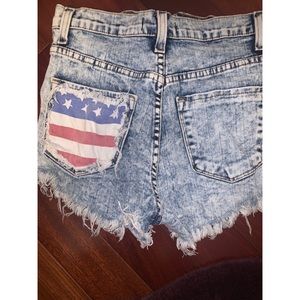 Vibrant high waisted American flag jean shorts